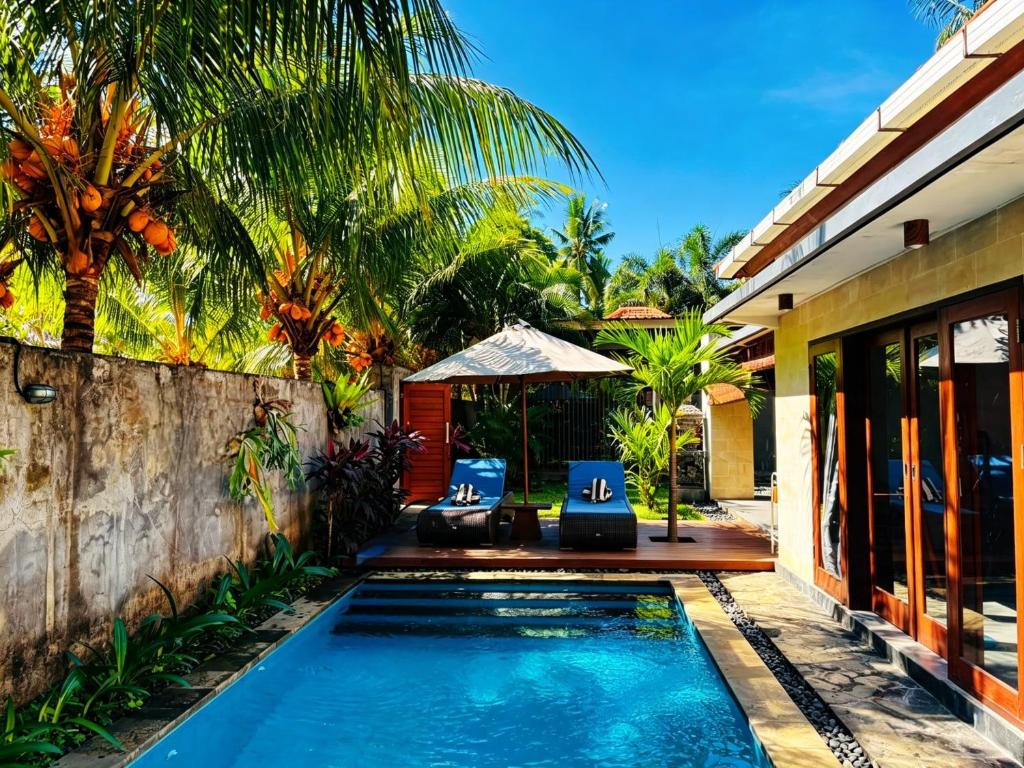 Coco Garden Pool Villas - Tap to explore photos
