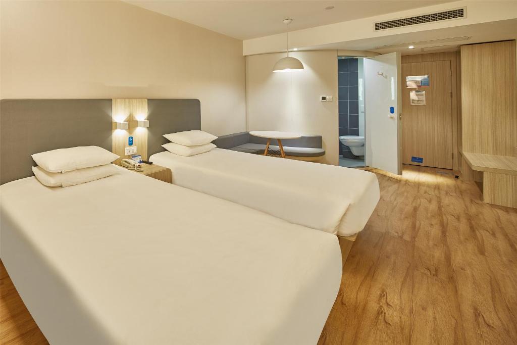 Двухместный (Двухместный номер с 2 отдельными кроватями), Hanting Express Suzhou International World Studios