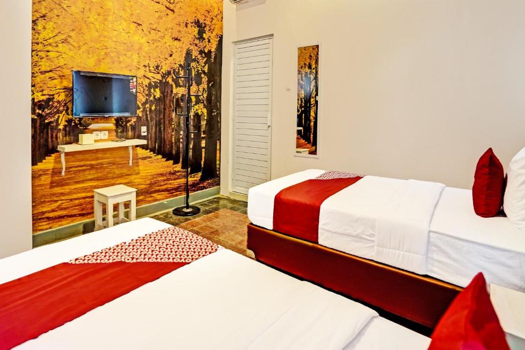 Hotel O Nawangwulan Room Type - Delxue Twin Room