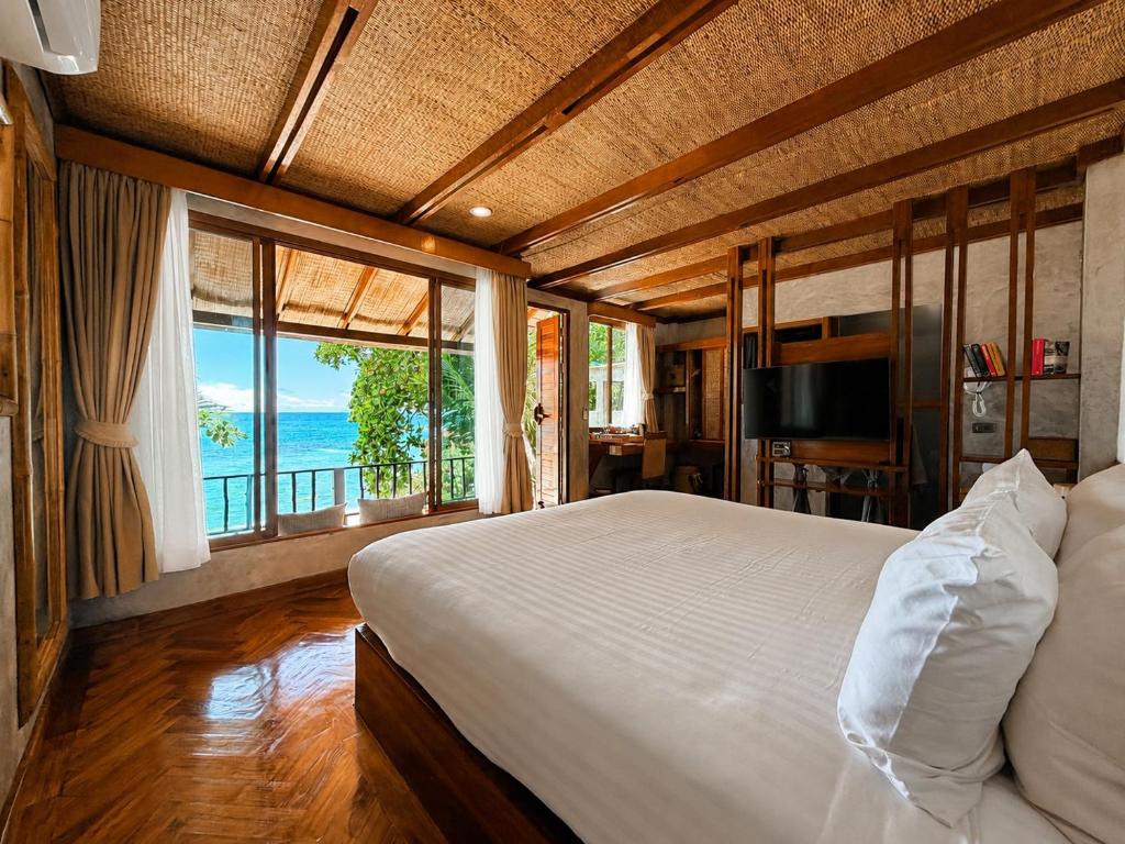 Sai Daeng Resort - Tap to explore photos