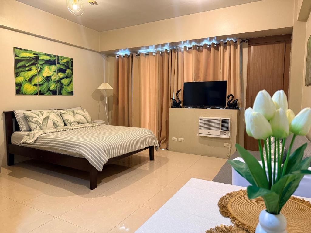 Condo 1 Palm Tree Across NAIA T3 - Tap to explore photos