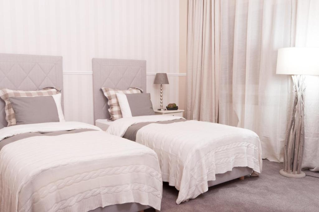 Двухместный (Просторный двухместный номер с 2 отдельными кроватями), Hotel Wodnik