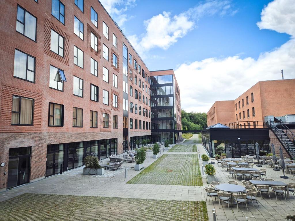 Hotel Odense - Tap to explore photos