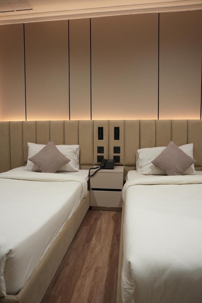 Laguna Hotel Suites - Tap to explore photos