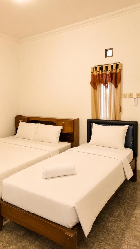 Ars Inn Eco Syariah Malioboro - Tap to explore photos