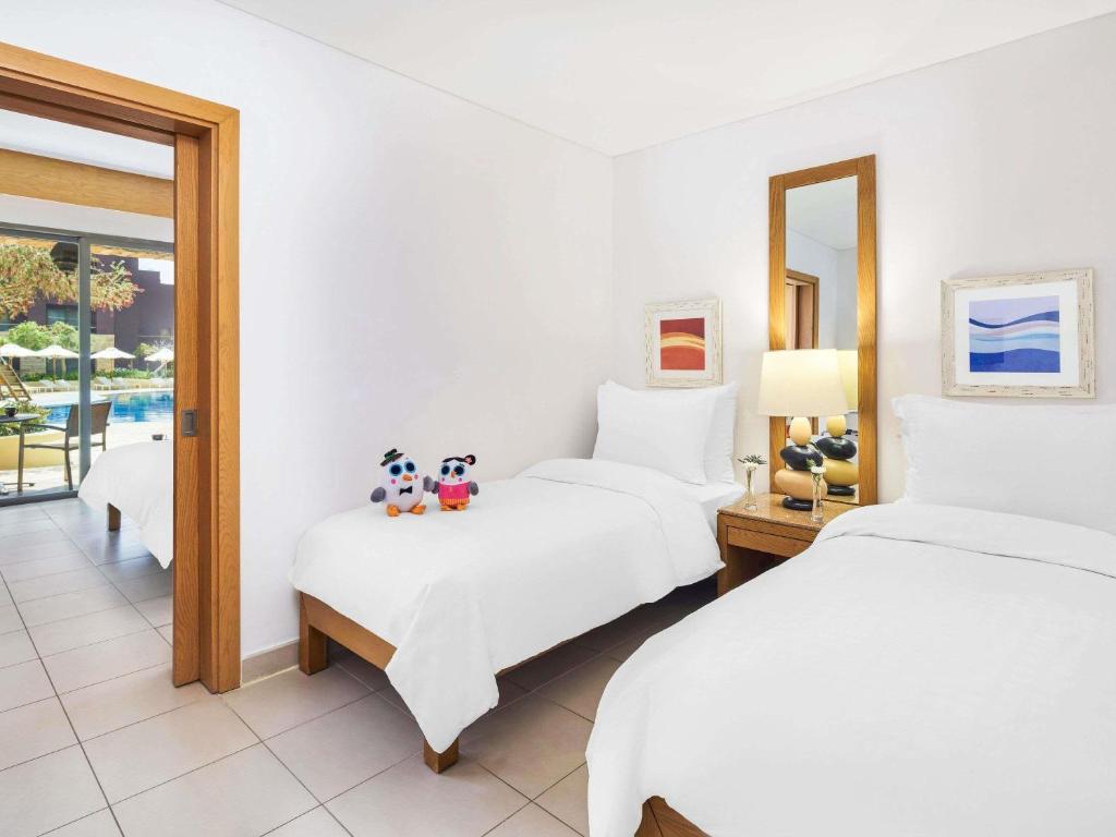 MOVENPICK RESORT TALA BAY Room Type - Superior Family Room with Pool View MOVENPICK RESORT TALA BAY Room Type - Superior Family Room with Pool View