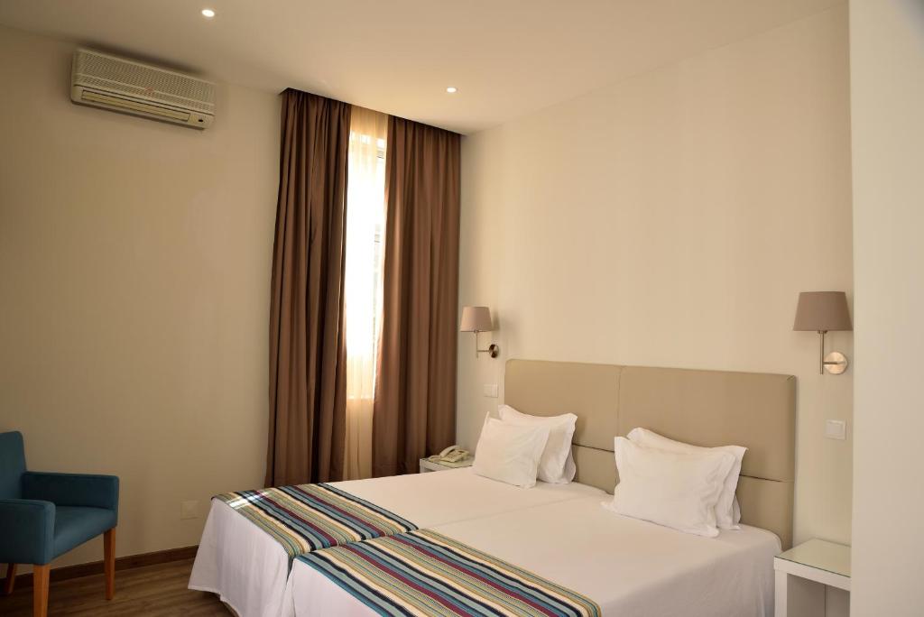 Двухместный (Двухместный номер с 2 отдельными кроватями), Porto Domus Hotel