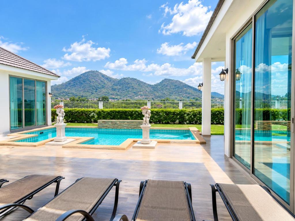 Luxurious 4-Bedroom Pool Villa with Best Mountain Views - Tap to explore photos