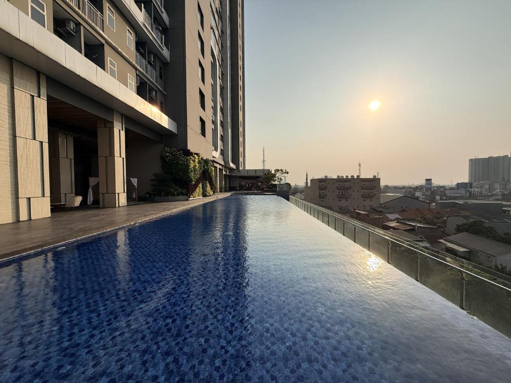 Apartement Springwood By LiviRooms Tangerang