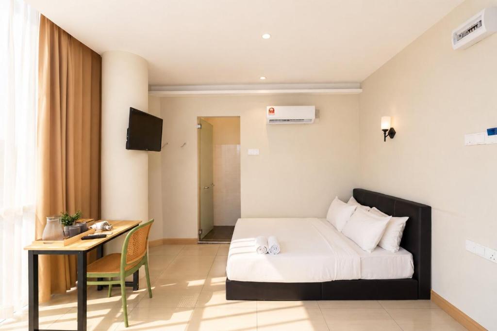 Swing and Pillows at PJ KD Room Type - Deluxe King Room