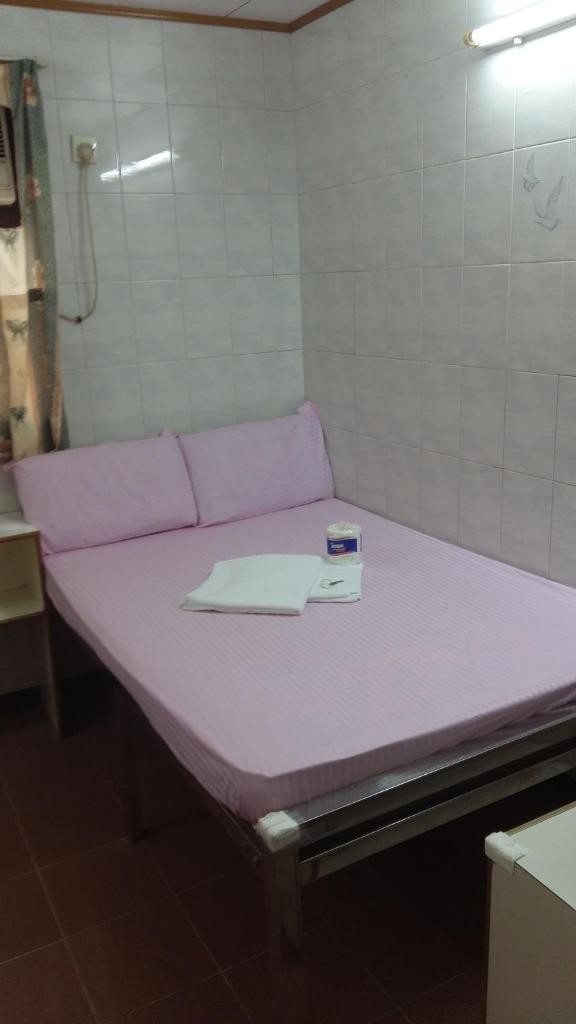 New Yan Yan Guest House reception 9th floor Flat E4 E6 photo 3