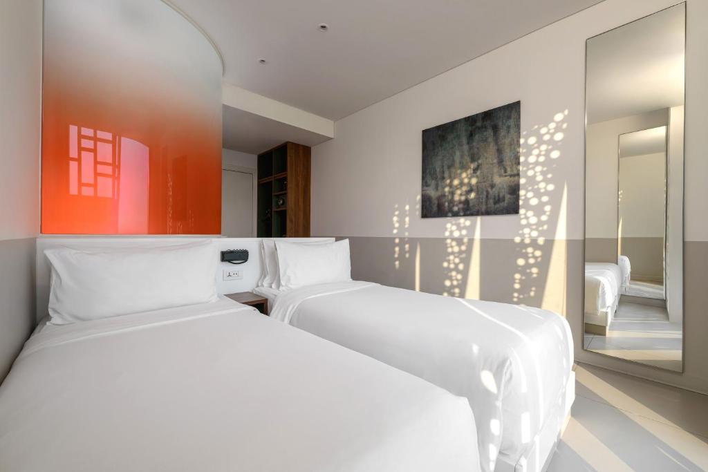 Wink Can Tho Centre, Unscripted by Hyatt- 24 hours stay Room Type - 2 Twin Beds City View