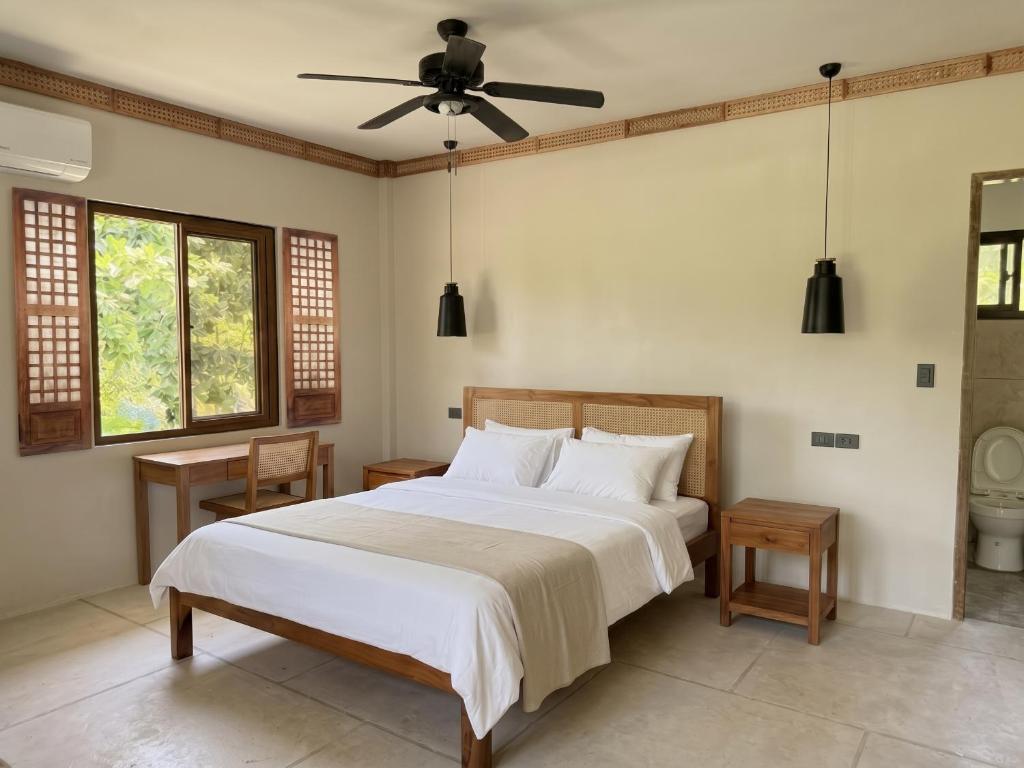 Eastwind Beach Villas - Tap to explore photos