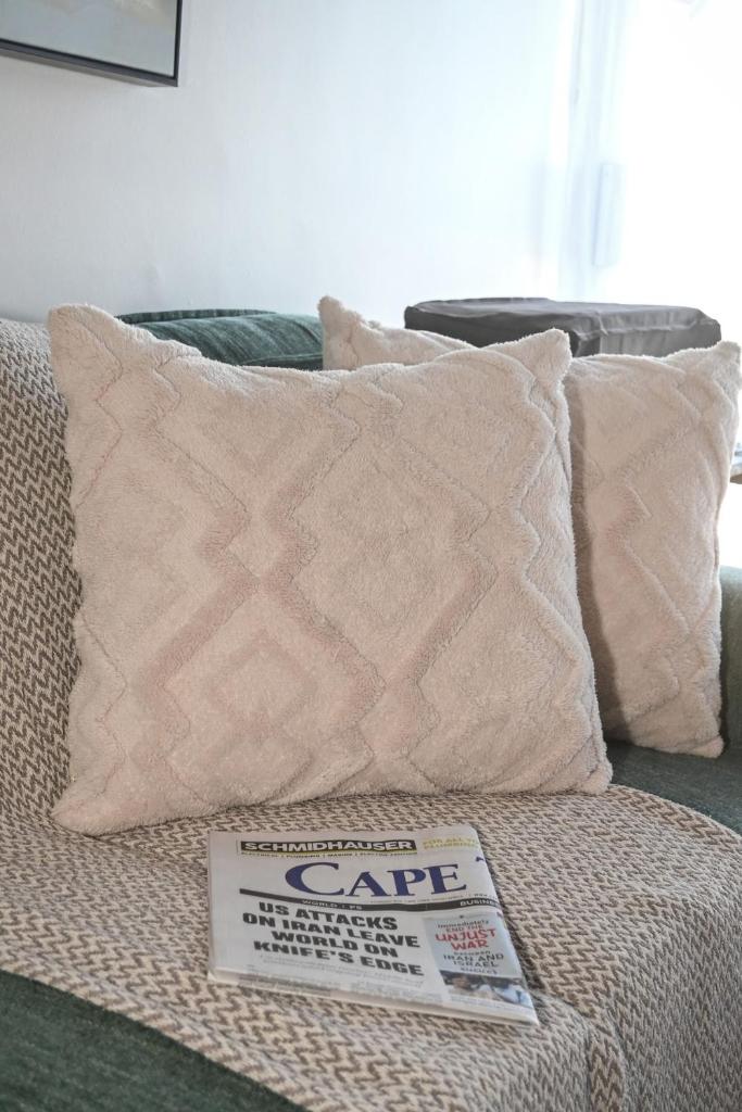 Unwind at Coral Bright 2BR Beach Apartment - Tap to explore photos