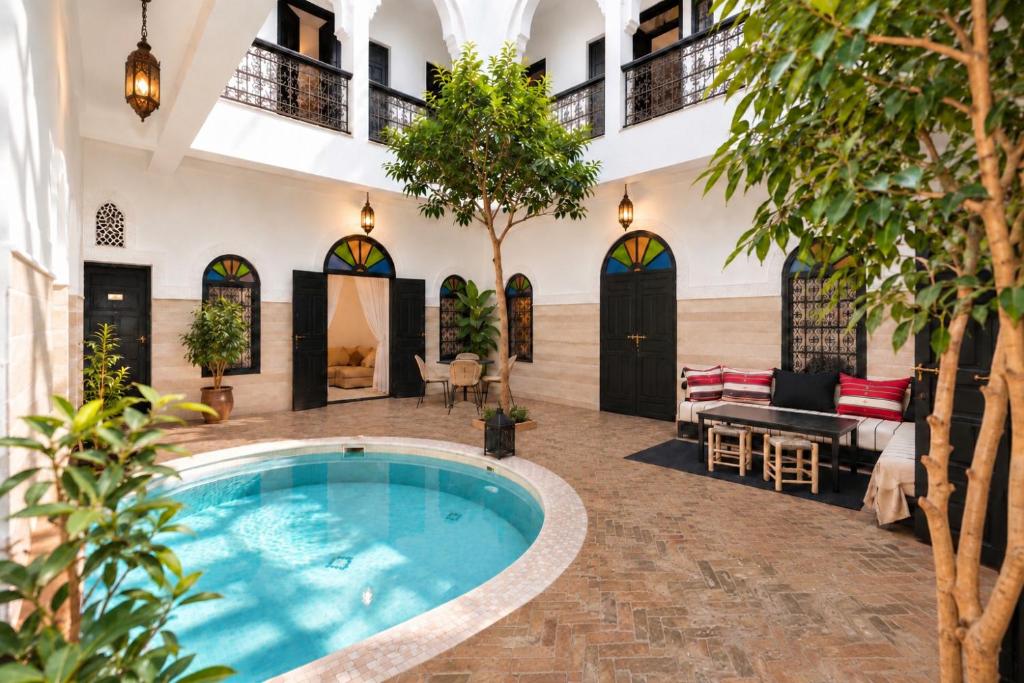 Riad El Gnaouia - Tap to explore photos