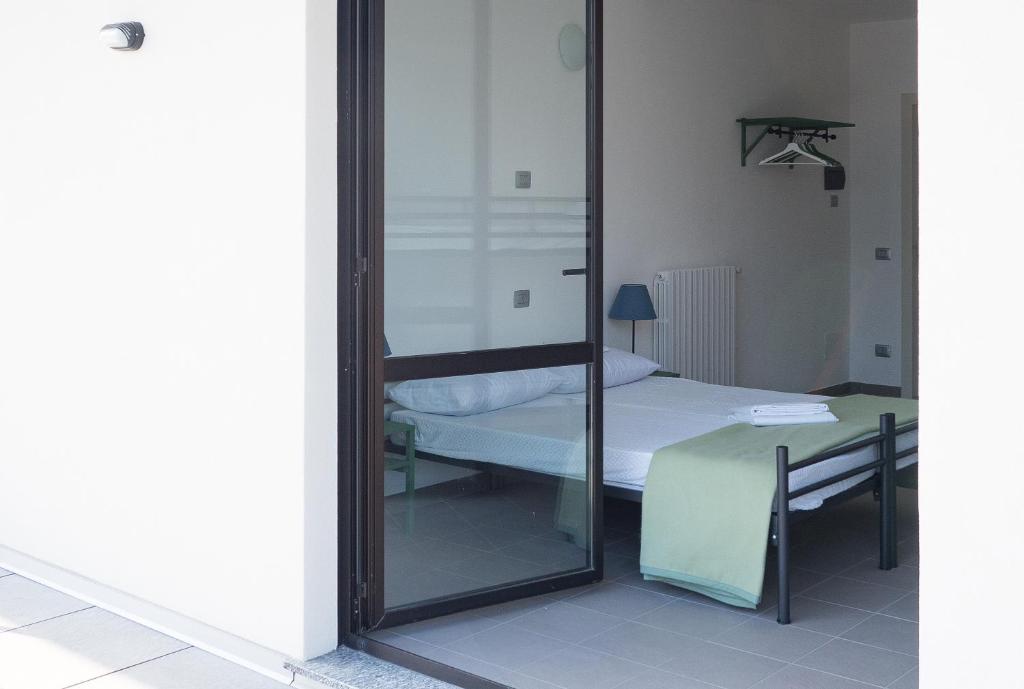 Lake Como Beach Hostel - Tap to explore photos