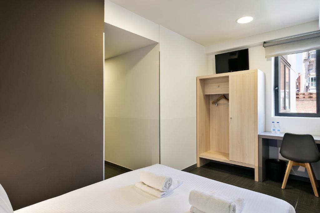Hotel Acta Laumon - Tap to explore photos