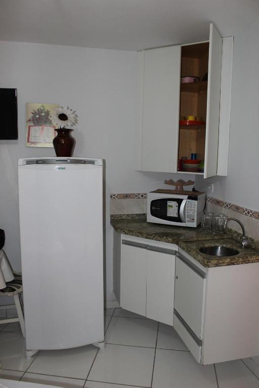 Kitchen, Apart Service Araras - VPC in Caldas Novas