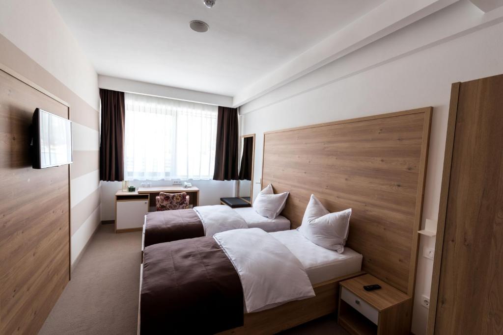 Deluxe szoba 1 kétszemélyes vagy 2 külön ággyal