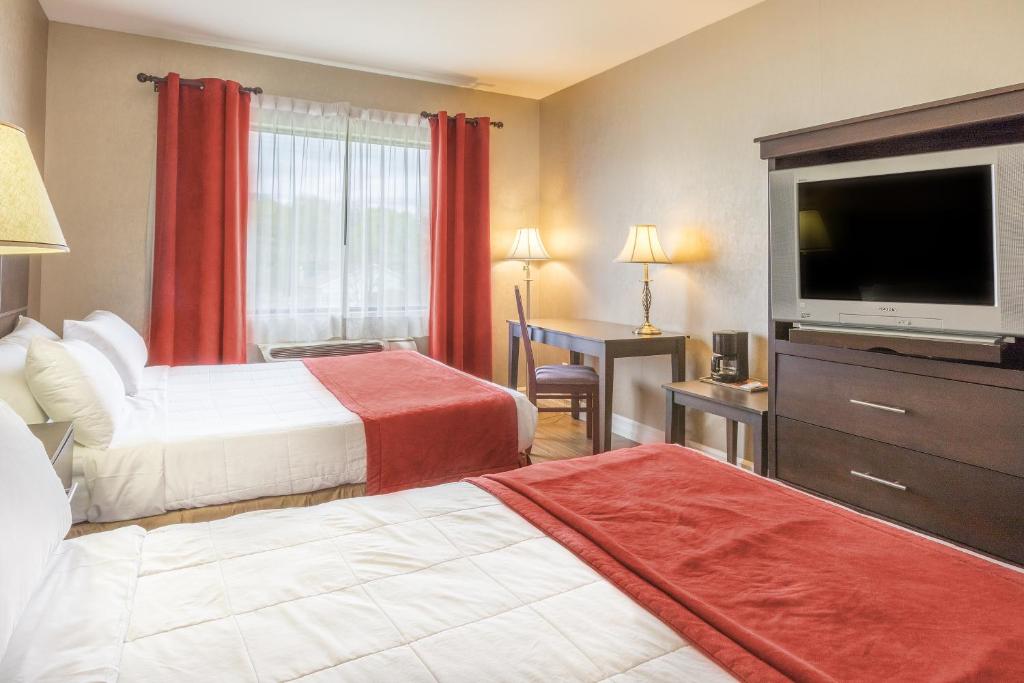 Ambassadeur Hotel Et Suites Photo 1