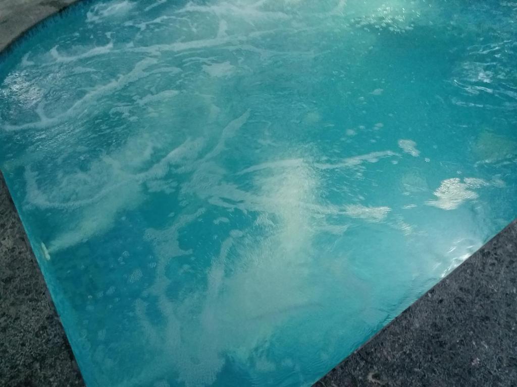 GR Stays 4bhk Private Villa with Private Jacuzzi Pool BAGA photo