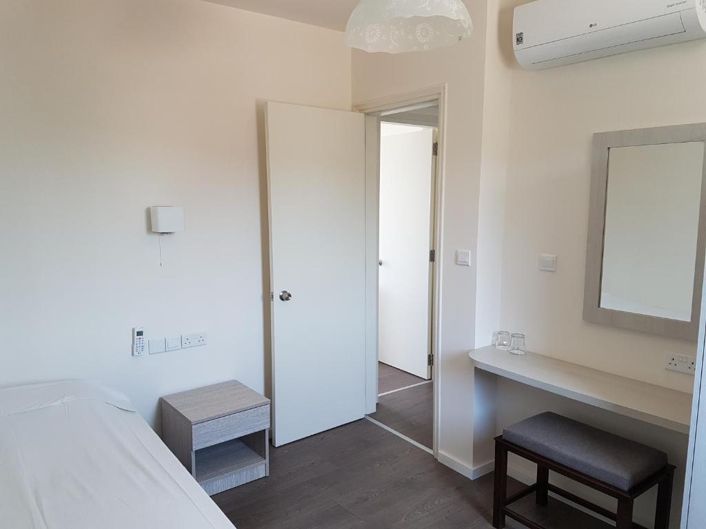 Aphrodite Beach Hotel — Pokoje in Neo Chorio, Region Pafos