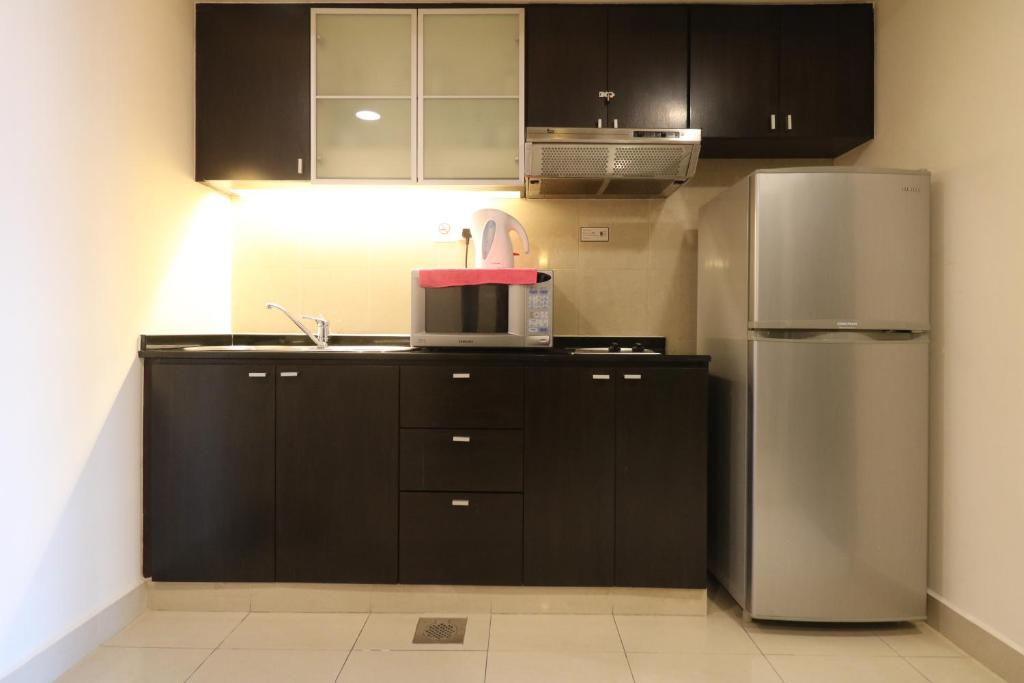 Kitchen, Millennium Suite At Pyramid Tower in Kuala Lumpur