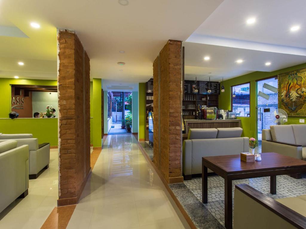 Shared lounge/TV area, Oasis Kathmandu Hotel in Kathmandu