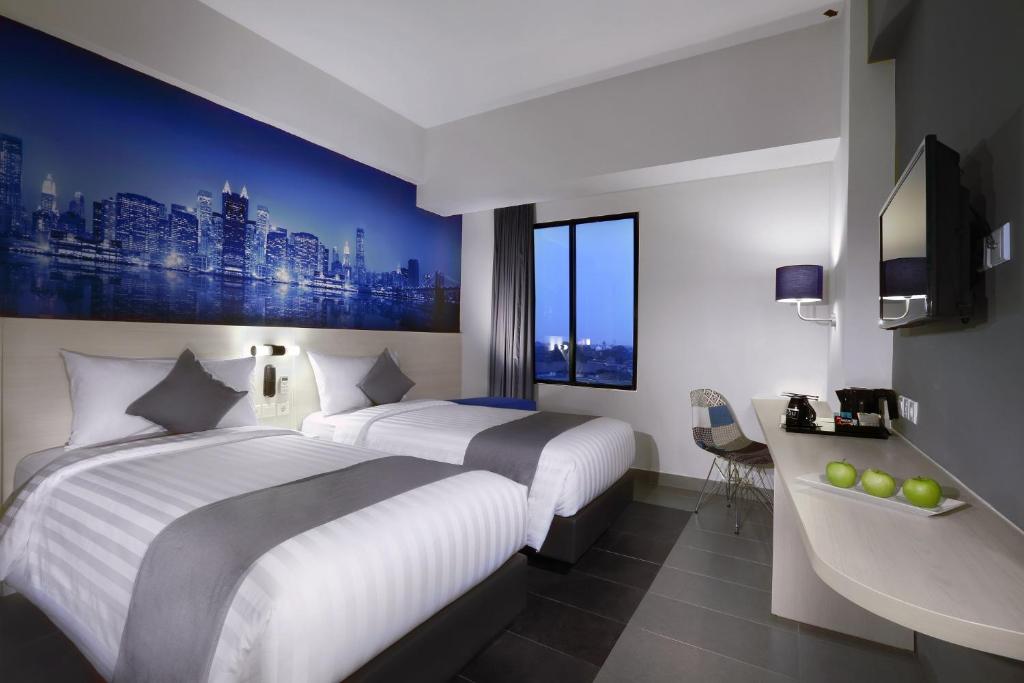 Kamar penginapan di hotel bintang 3 Hotel Neo+ Kebayoran Jakarta.