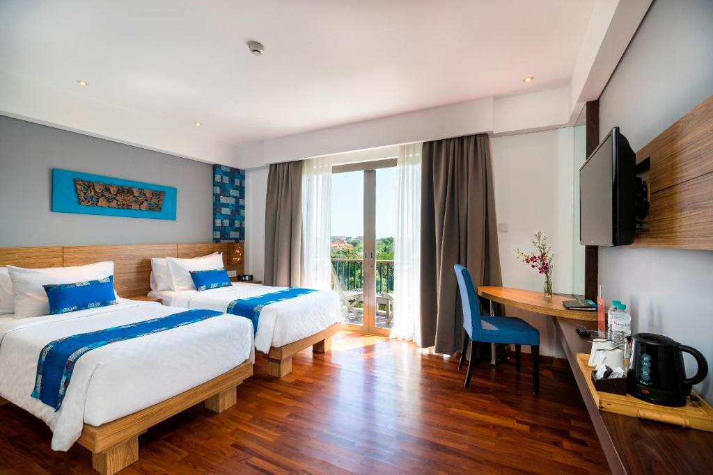 Kamar penginapan di D'Primahotel Petitenget Seminyak.