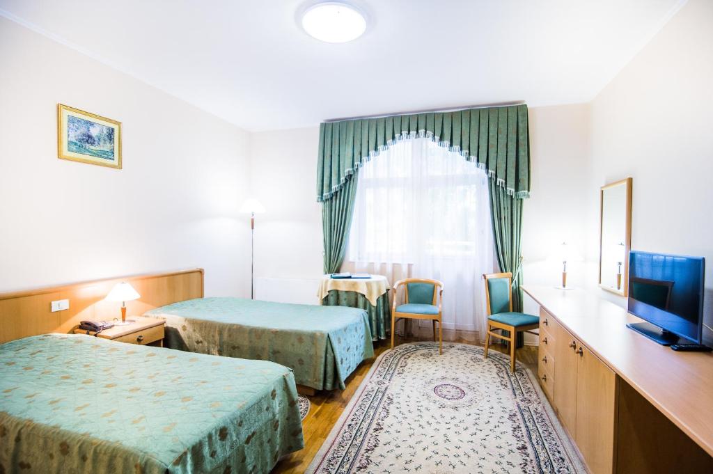 Double or Twin Room with Balcony - Treatment Included