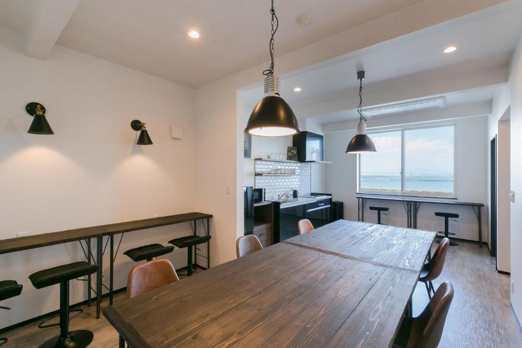 Shared lounge/TV area, Guest House Diphylleia Grayi in Hiroshima