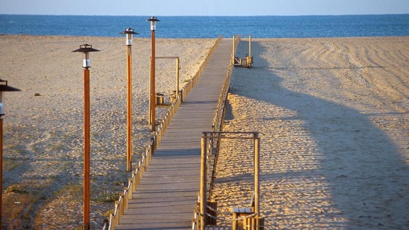 NEW APT center 1 min walk beach/river/casino!!! photo