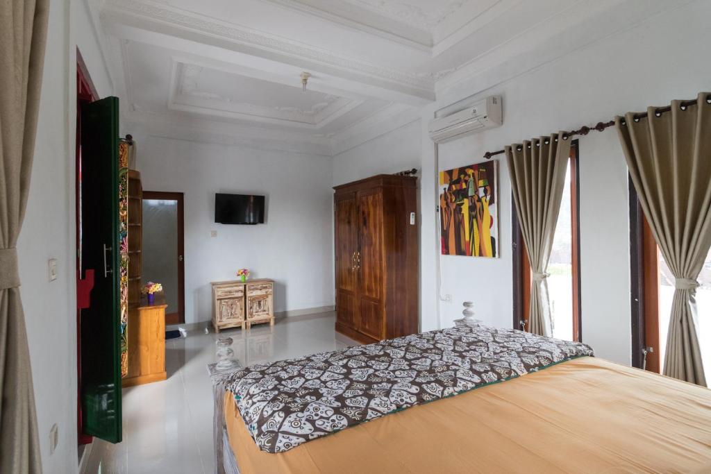 Deluxe Double Room with Balcony and Sea View, Bay View House in Bali