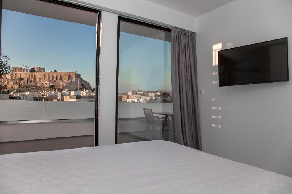 Luxury Penthouse touching the Acropolis by GHH photo