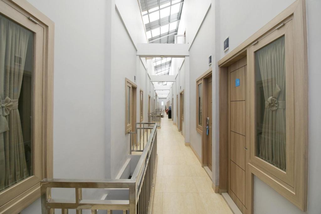 RedDoorz near Jalan Kolonel Haji Burlian Palembang