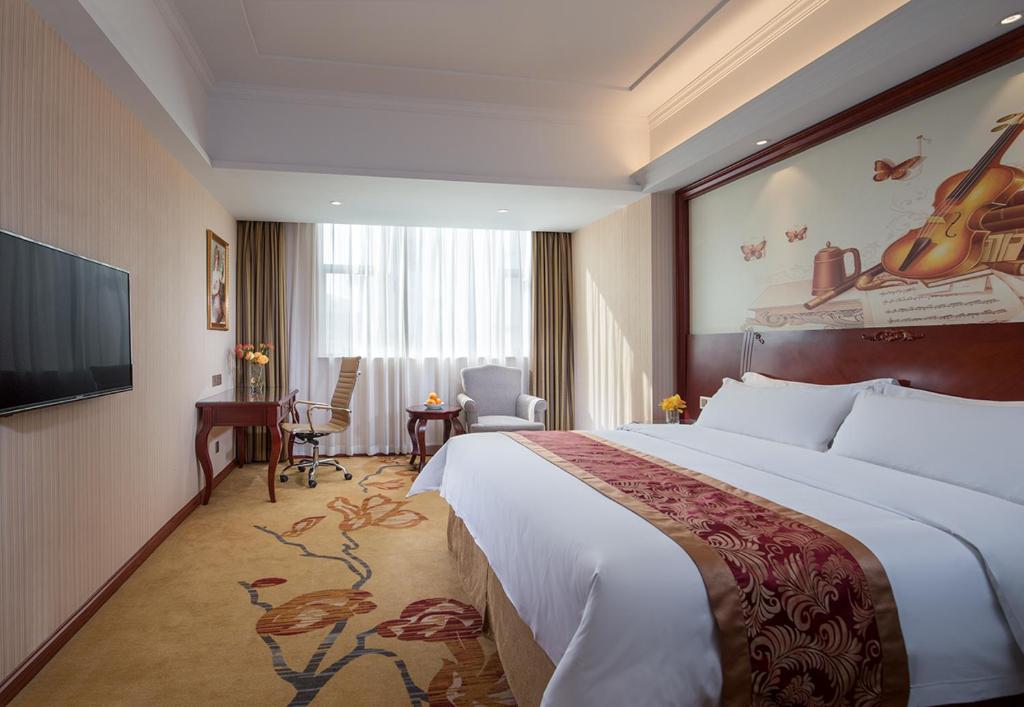 Vienna Hotel Zhongshan Guzhen Town Center photo