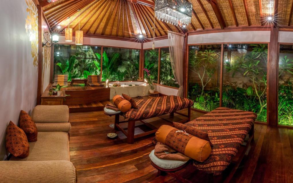 Luxury Balinese style spa room with tropical garden
