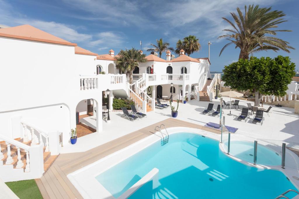 Apartamentos LIVVO Galera Beach — Swimming pool in Corralejo, Canary Islands