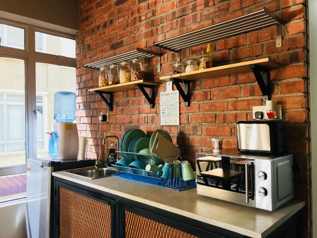 Kitchen, The Good Travelers Hostel - KL Airport in Kuala Lumpur