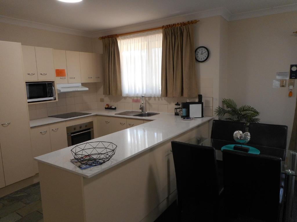 Kitchen, Beaches Serviced Apartments in Port Stephens