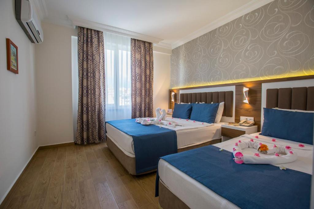Club Big Blue Suit Hotel - All Inclusive Plus — Hotel rooms in Alanya