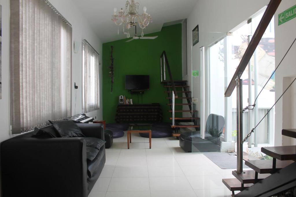 Shared lounge/TV area, Link Cordoba Hostel in Cordoba