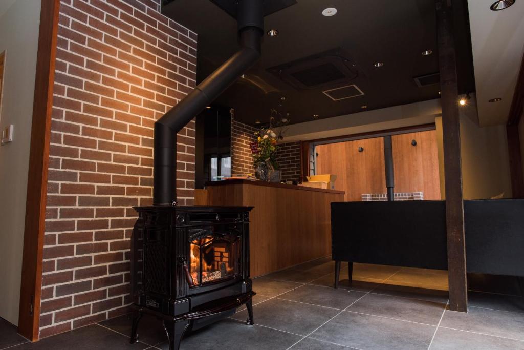 Shared lounge/TV area, Cafe & Guest House Nagonoya in Nagoya