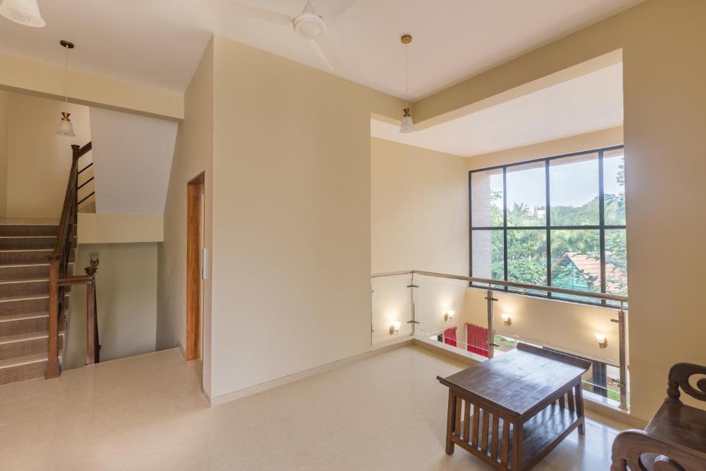 StayVista at Greenwoods Nine Villa photo