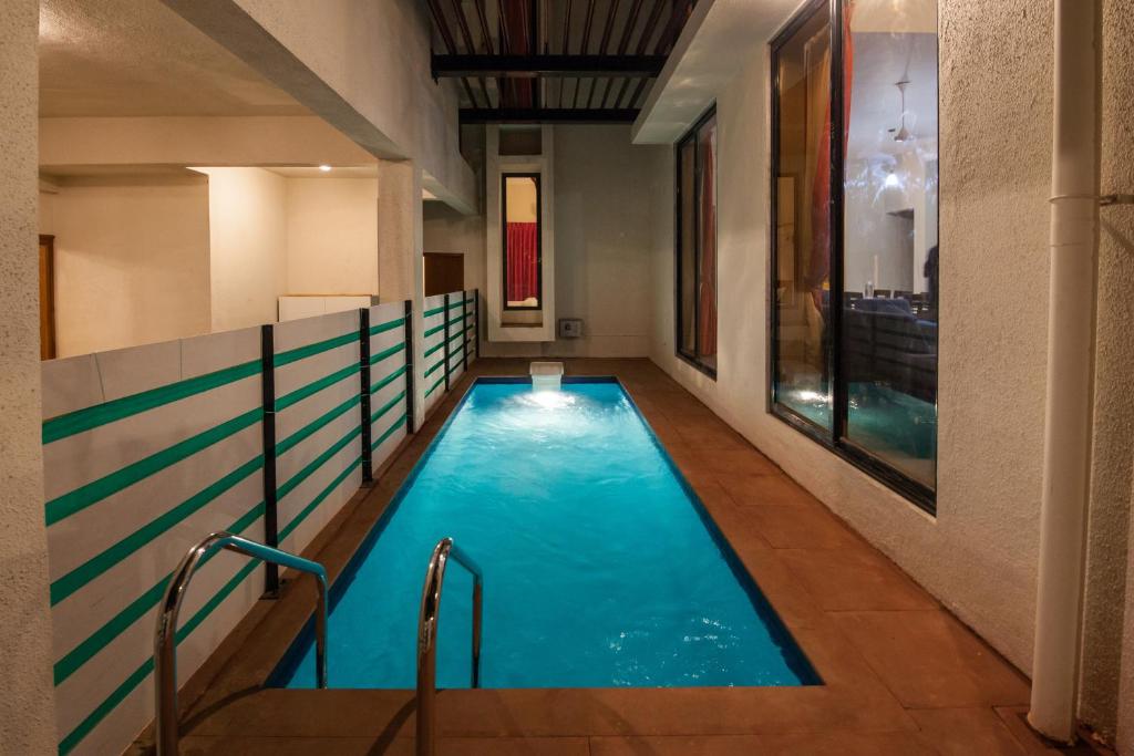 StayVista at Greenwoods Nine Villa photo