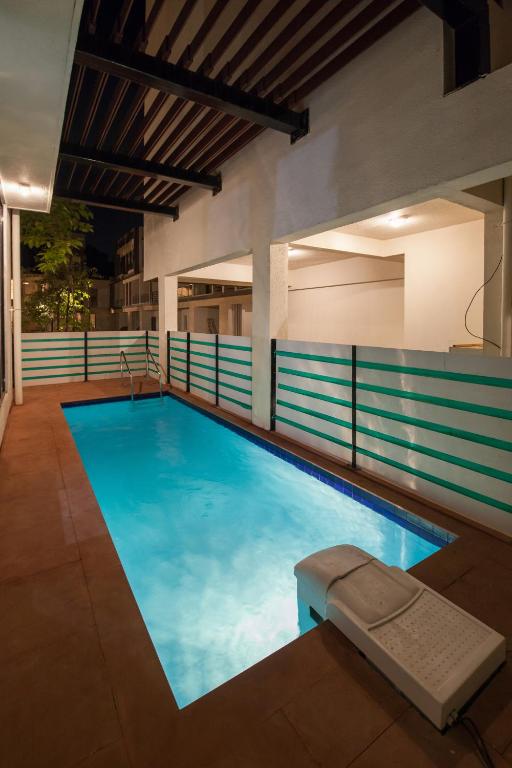 StayVista at Greenwoods Nine Villa photo