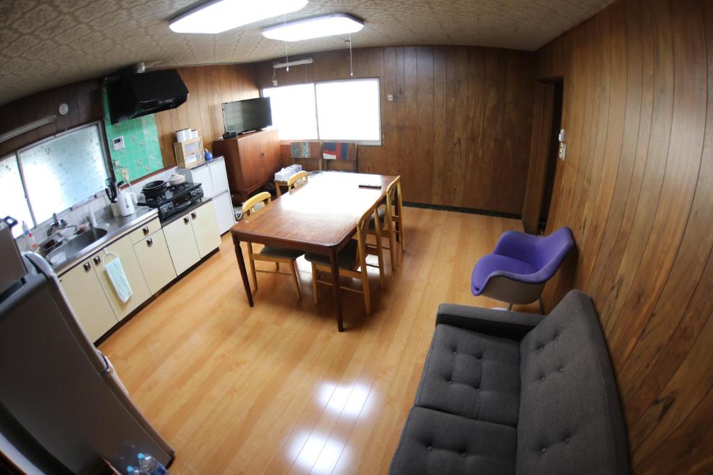 Shared lounge/TV area, Guest house Omihachiman in Omihachiman