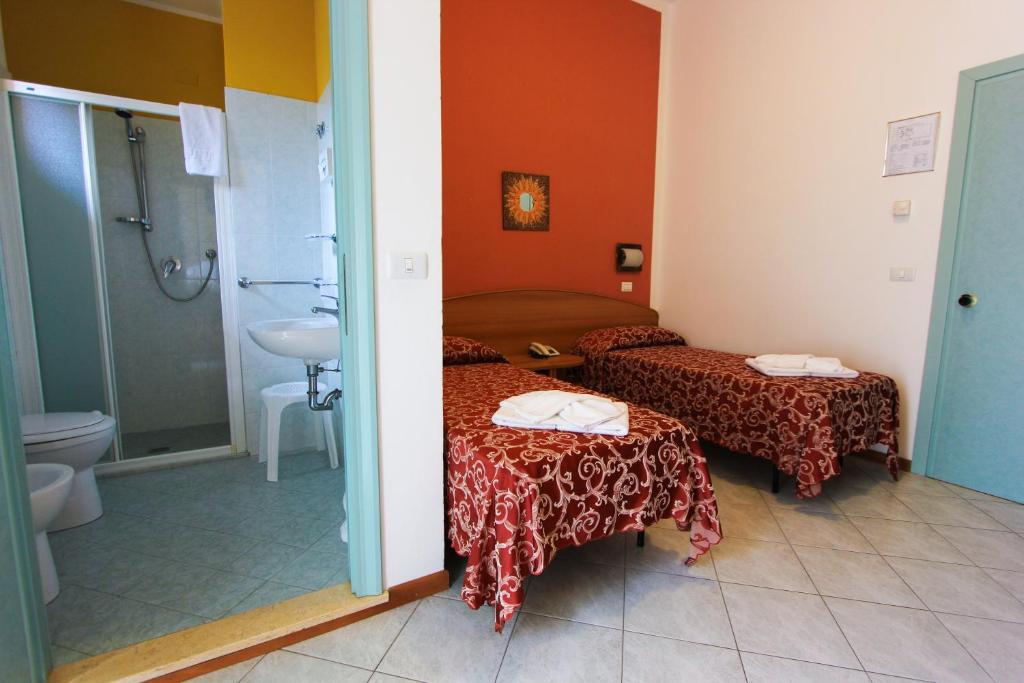 Hotel Bahama — Pokoje in Rimini, Emilia-Romania