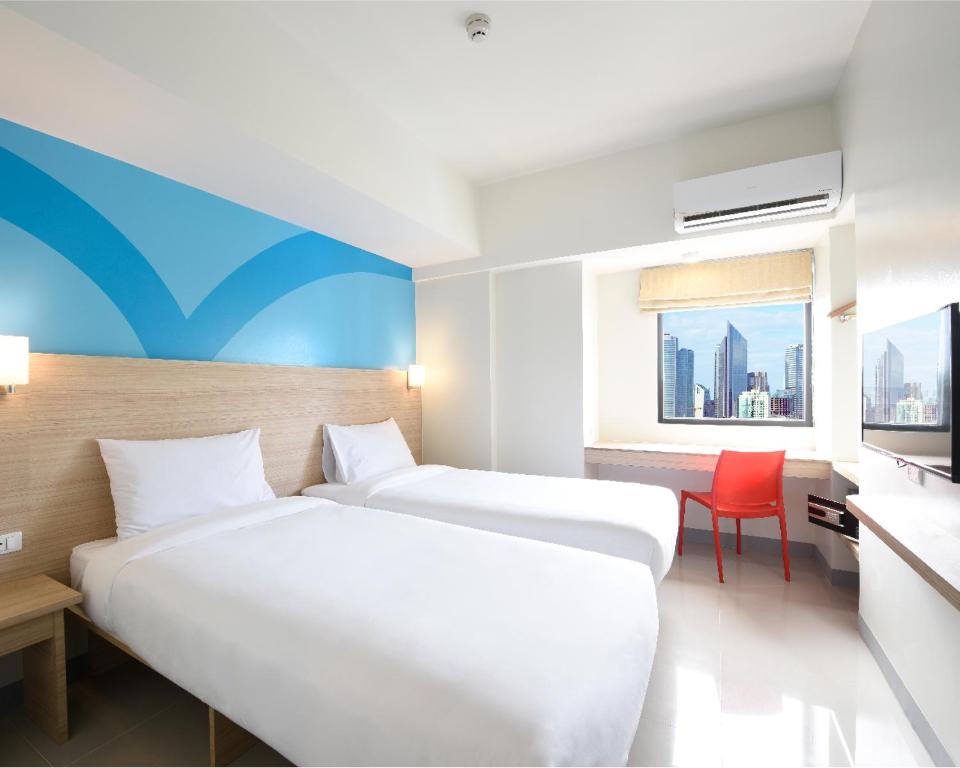 홉 인 호텔 침실